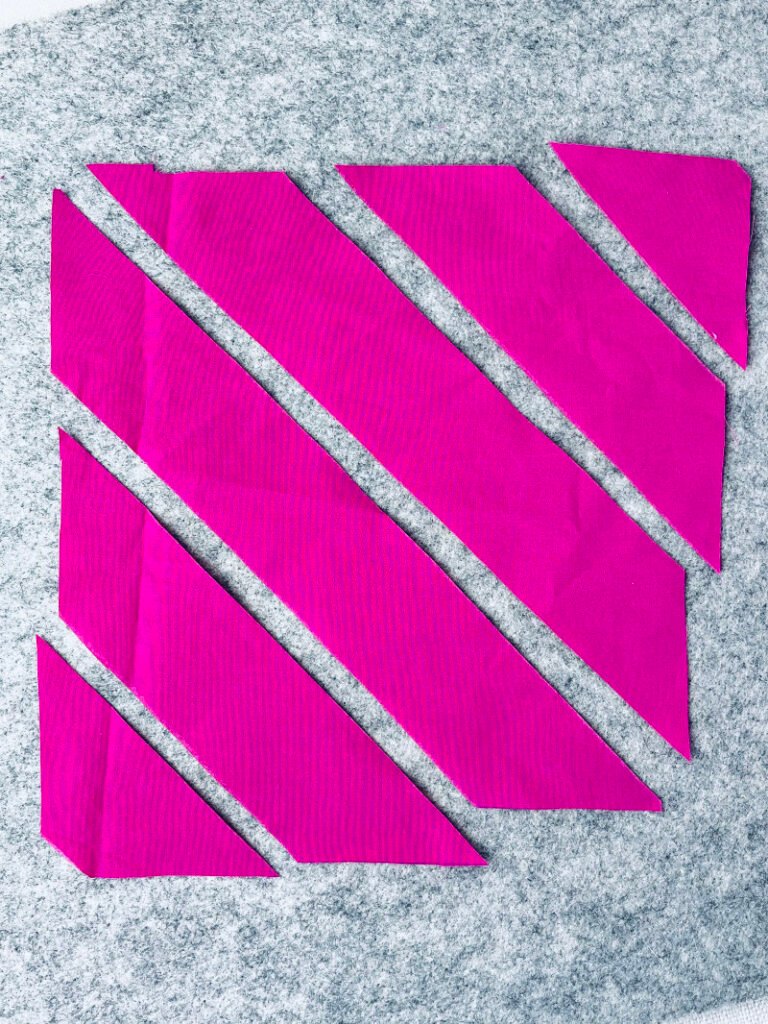How to Make Bias Binding (Step-by-Step Tutorial for Beginners) Cutting fabric into diagonal bias strips for making bias binding.