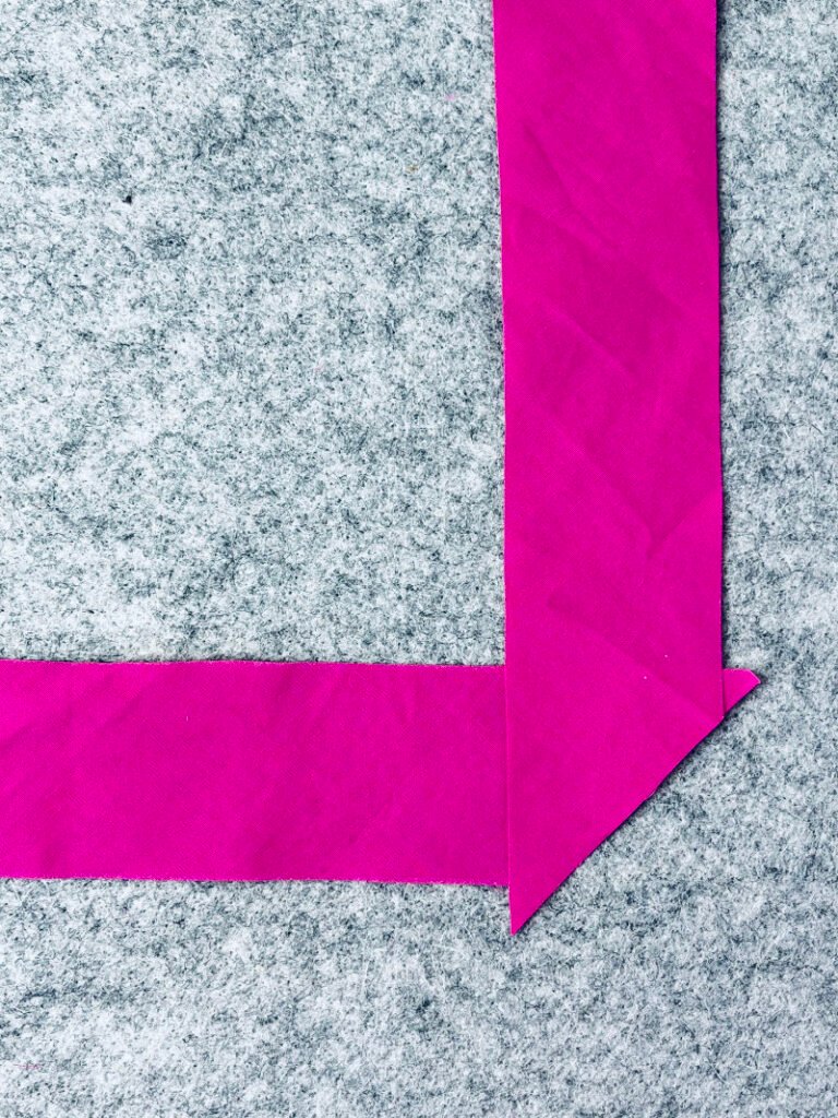How to Make Bias Binding (Step-by-Step Tutorial for Beginners) Joining bias strips with diagonal seam to reduce bulk in continuous bias binding.