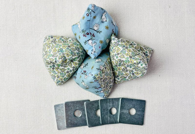 Sewing Pattern Drafting Tools You Actually Need Metal washers and handmade rice bags used as pattern weights to hold sewing pattern paper in place