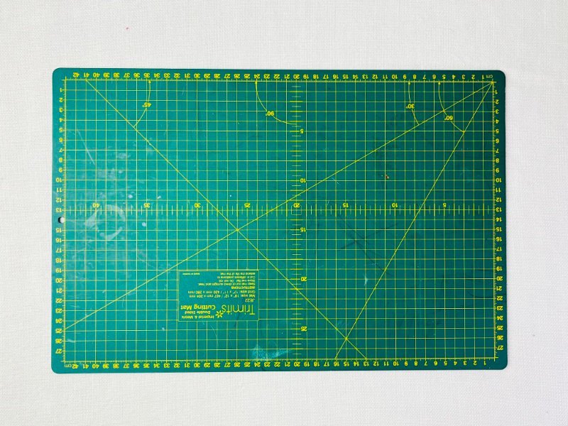 Sewing Pattern Drafting Tools You Actually Need Large cutting and tracing mat used as drafting surface for sewing patterns