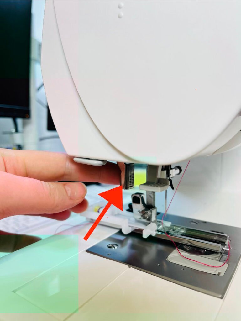 lowering buttonhole lever before sewing automatic buttonhole