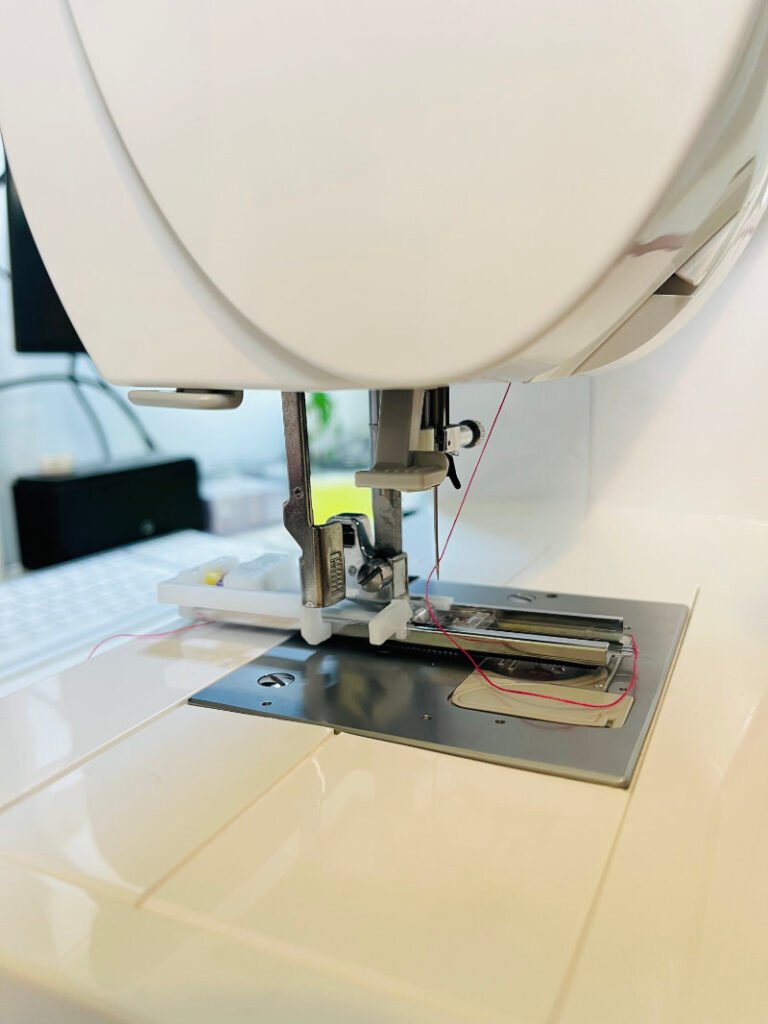 lowered buttonhole lever before sewing automatic buttonhole