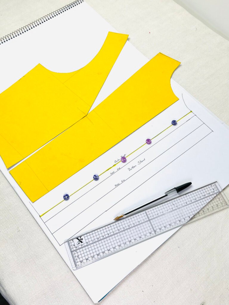 How to Draft a Button Stand (Step-by-Step Pattern Drafting Tutorial) Evenly spaced button markings 7 cm apart on bodice front