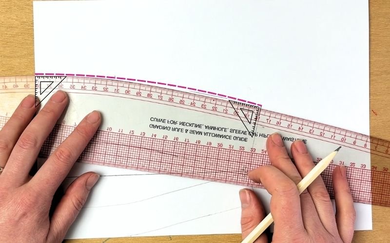 shaping collar leaf edge using french curve during collar drafting