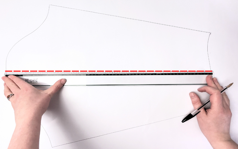 Basic sleeve block with centre line marked from shoulder to wrist for shirt sleeve pattern modification