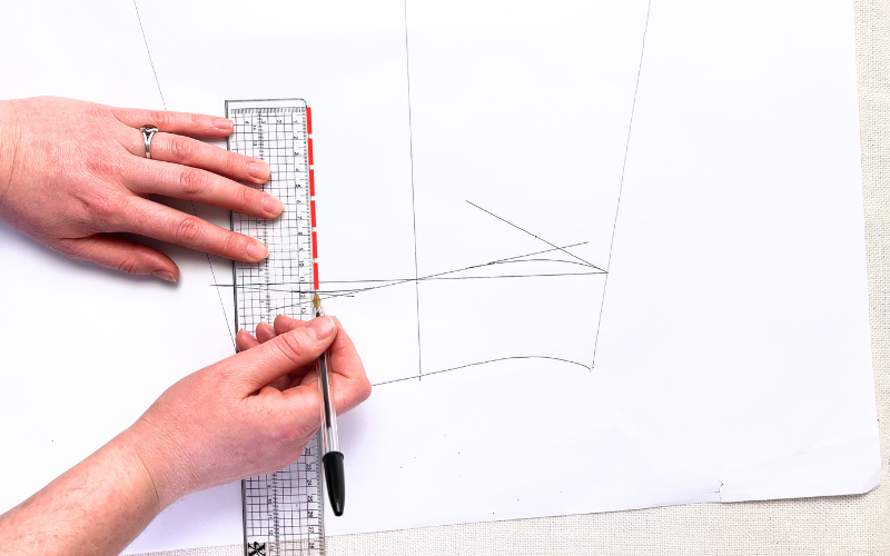 Marking the sleeve slit position on the back portion of a shirt sleeve pattern