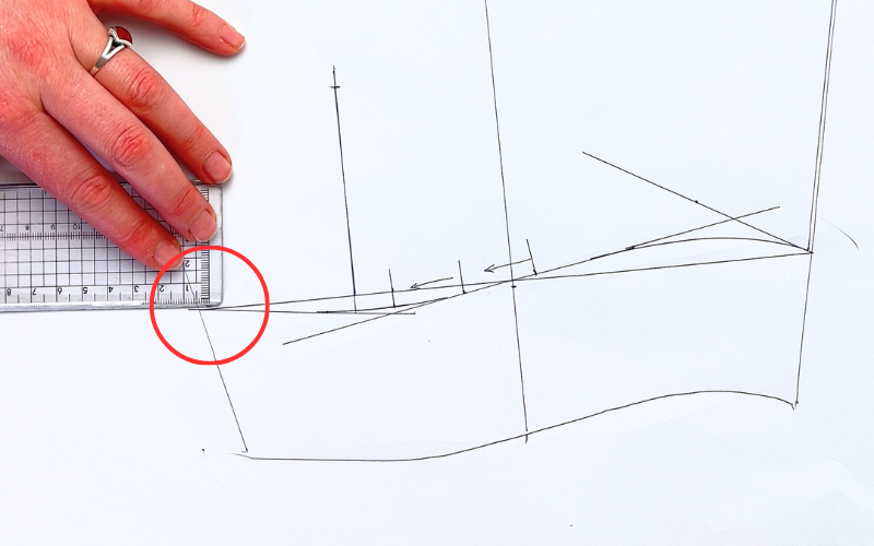 Adjusting sleeve side seams inward to match sleeve opening with cuff dimensions