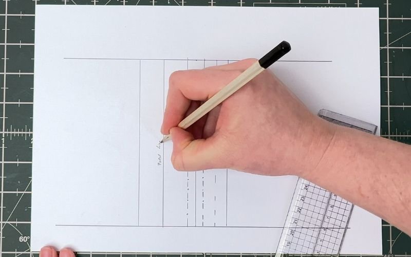 How to Draft a Shirt Sleeve Placket Pattern (Step-by-Step) Marking a fold line for the outer placket on the pattern