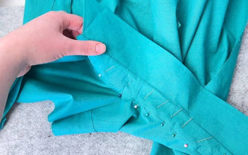 pinning collar stand from outside to stitch in the ditch