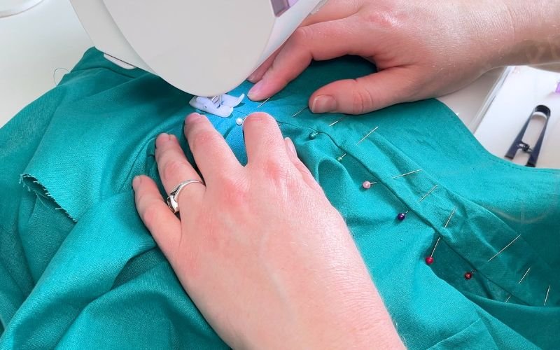 sewing in the ditch to secure inner collar stand neatly