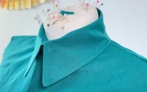 How to Sew a Collar and Collar Stand (Step-by-Step Shirt Tutorial) completed fold over shirt collar with smooth neckline finish