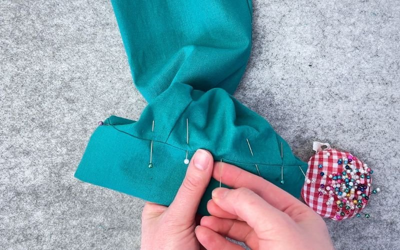 Pinning the cuff before sewing