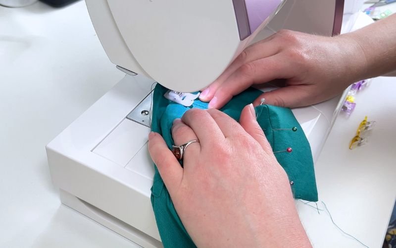Stitching in the ditch to complete the shirt sleeve cuffs
