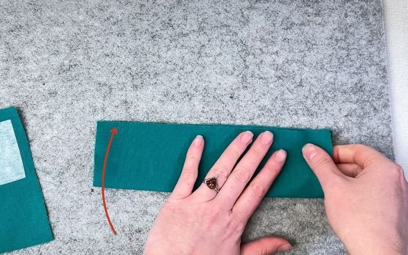 Folding sleeve cuff lengthways before marking
