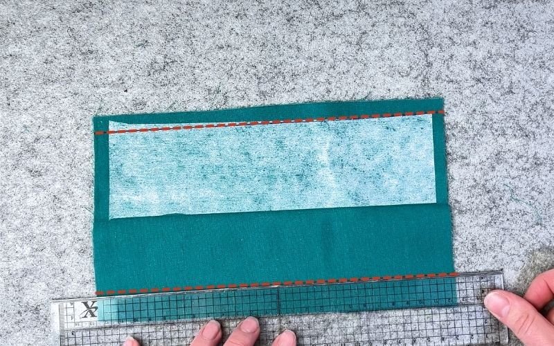 Marking seam guides on prepared shirt sleeve cuff