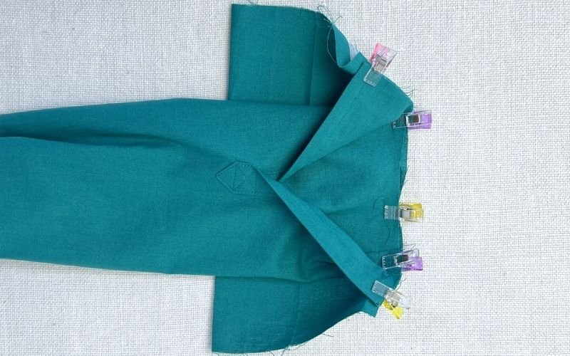 Attaching shirt sleeve cuff to sleeve opening with right sides facing