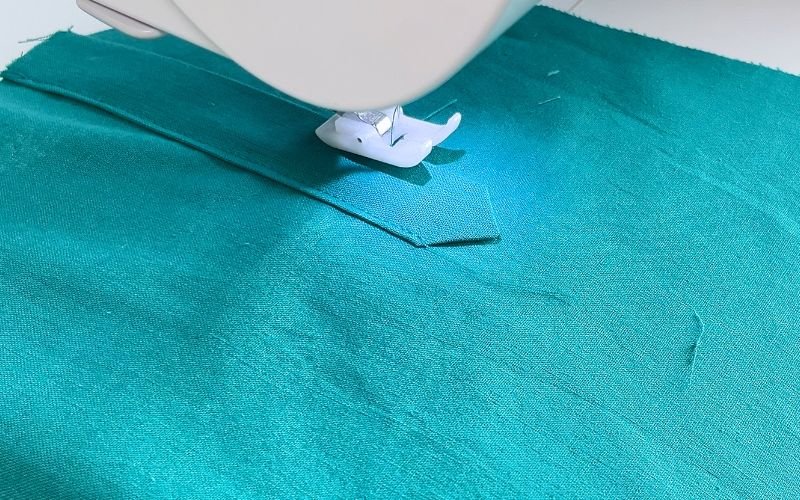 Stitching decorative top with triangle reinforcement