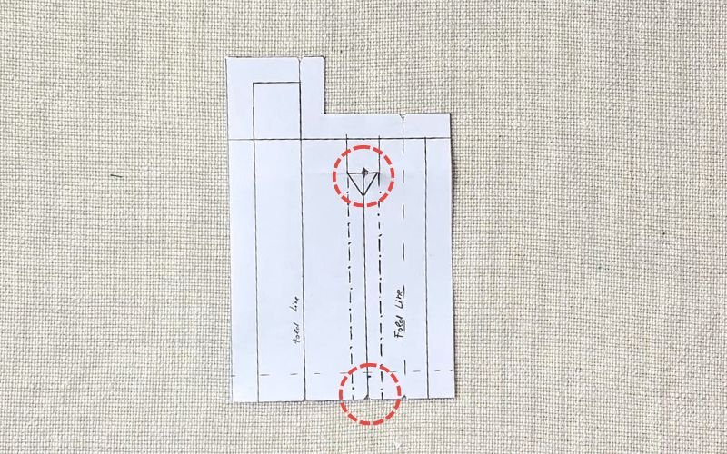 Sleeve placket with slit markings and notches prepared for sleeve placket sewing