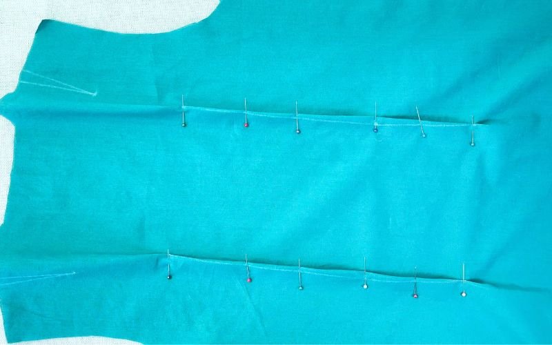 How to Sew Darts on a Shirt: Precise Marking, Transfer and Sewing Tutorial fabric folded and pinned to prepare dart for sewing