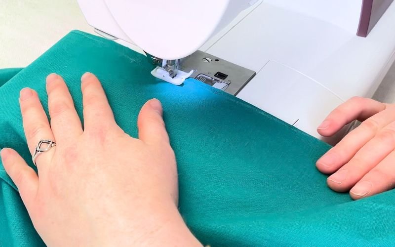How to Sew Darts on a Shirt: Precise Marking, Transfer and Sewing Tutorial sewing closed dart from tip to tip on fabric with even stitching