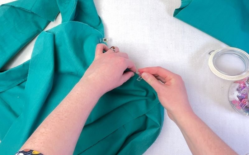 Pinning sleeve armpit section to shirt bodice