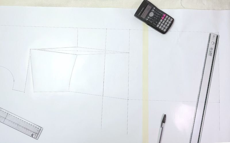 Side seam guide formed before smoothing the curves on a shirt dress pattern