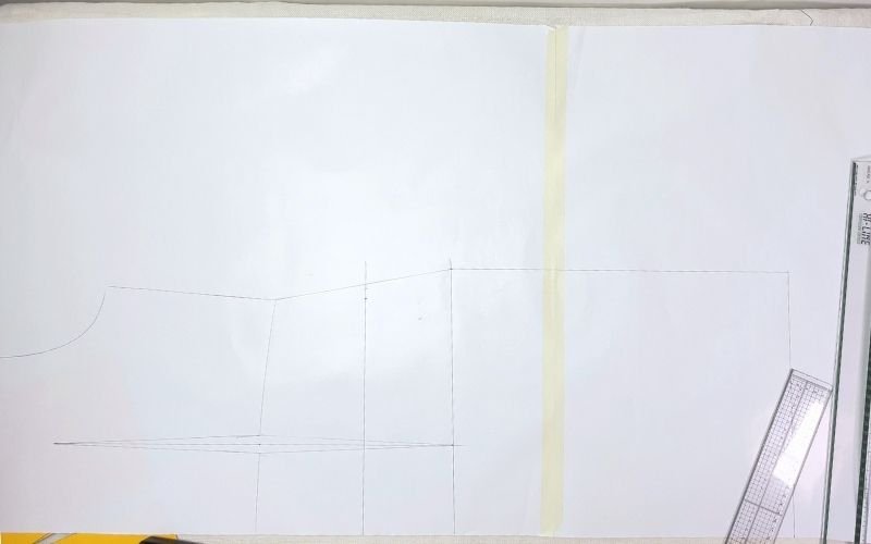 Back pattern piece for shirt dress sewing pattern completed before correcting side seam length