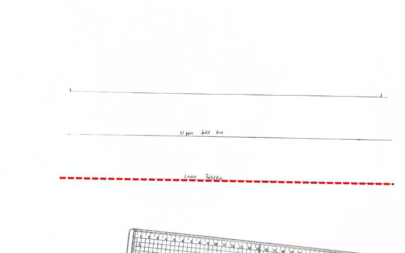 How to Draft a Roll-Up Sleeve Pattern (Step-by-Step Tutorial) Drafting lower fold line on a roll-up sleeve facing