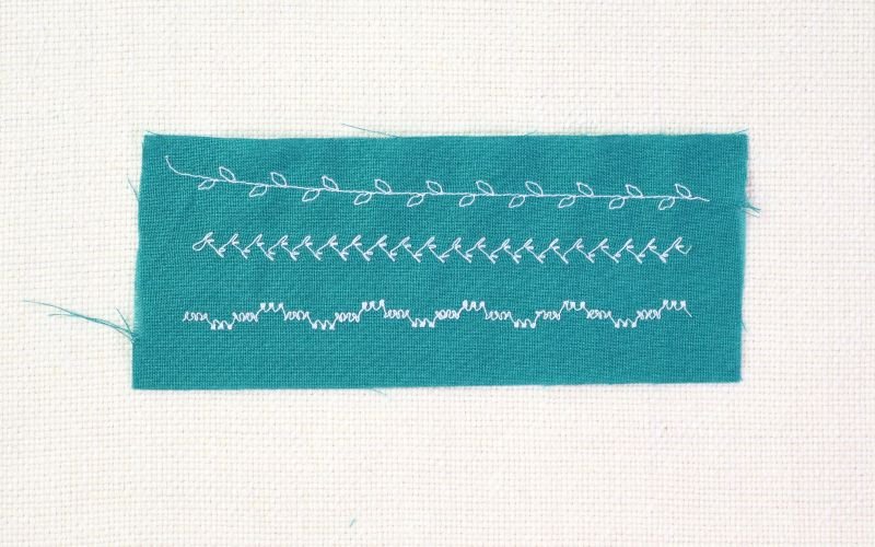 9 Basic Sewing Stitches Every Beginner Must Master Decorative sewing stitch samples showing embroidery stitch sewn with contrasting thread