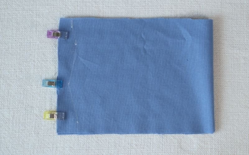 How to Sew Roll-Up Sleeves: Step-by-Step Guide Roll-up sleeve extension with side seams pinned showing the marked sewing guide line