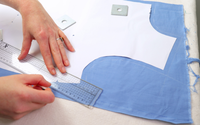 Adding seam allowance around a self-drafted shirt dress pattern before cutting the fabric