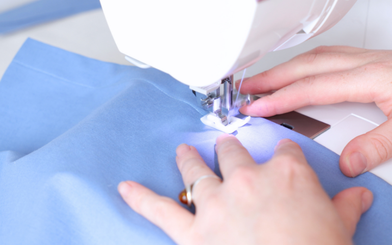Topstitching the button stand from the right side of the shirt dress