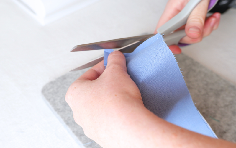 Trimming the corners of a shirt collar before turning it right side out